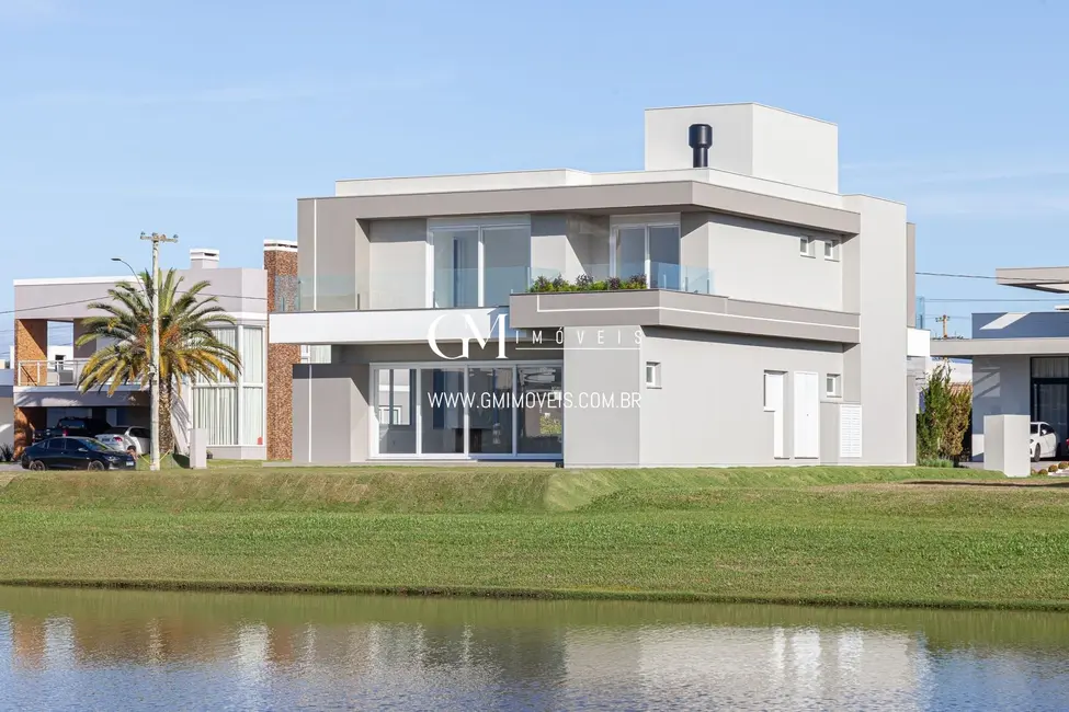 Foto 5 de Casa de Condomínio com 4 quartos à venda, 308m2 em Torres - RS