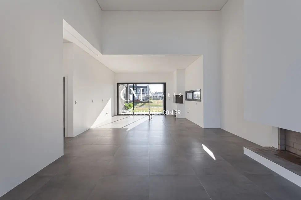 Casa de Condomínio com 3 quartos à venda, 205m2 em Torres - RS - imagem 3 Foto 3 de Casa de Condomínio com 3 quartos à venda, 205m2 em Torres - RS