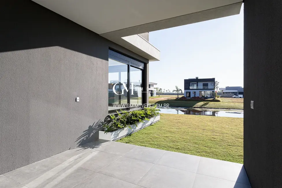 Casa de Condomínio com 3 quartos à venda, 205m2 em Torres - RS - imagem 8 Foto 8 de Casa de Condomínio com 3 quartos à venda, 205m2 em Torres - RS