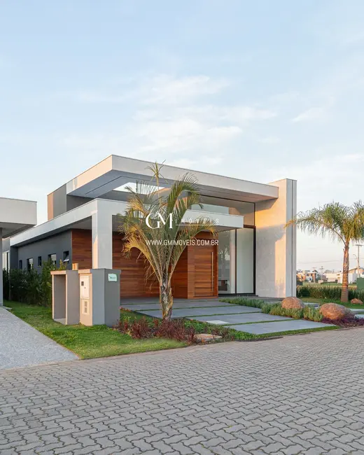 Casa de Condomínio com 3 quartos à venda, 205m2 em Torres - RS - imagem 5 Foto 5 de Casa de Condomínio com 3 quartos à venda, 205m2 em Torres - RS