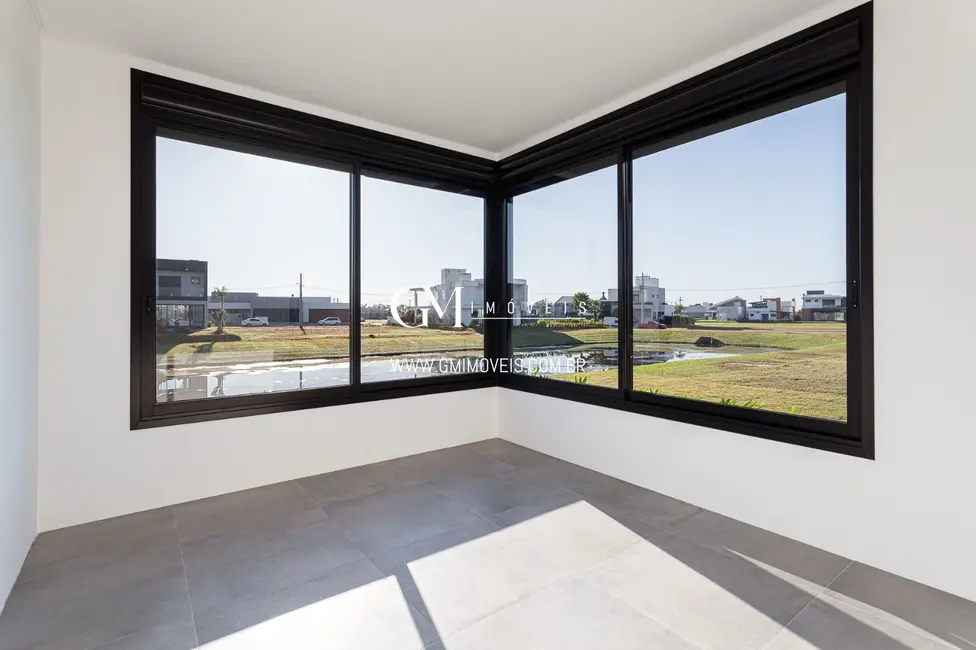 Casa de Condomínio com 3 quartos à venda, 205m2 em Torres - RS - imagem 6 Foto 6 de Casa de Condomínio com 3 quartos à venda, 205m2 em Torres - RS