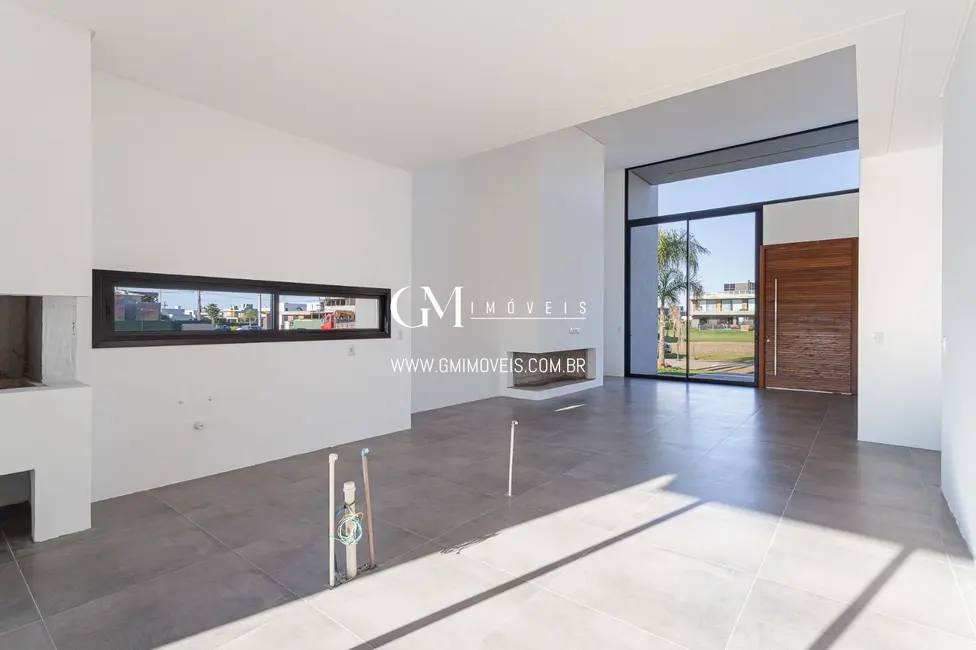 Casa de Condomínio com 3 quartos à venda, 205m2 em Torres - RS - imagem 7 Foto 7 de Casa de Condomínio com 3 quartos à venda, 205m2 em Torres - RS