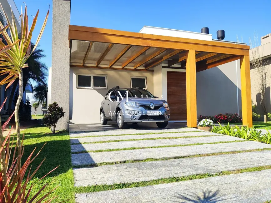 Foto 3 de Casa de Condomínio com 3 quartos à venda, 198m2 em Torres - RS