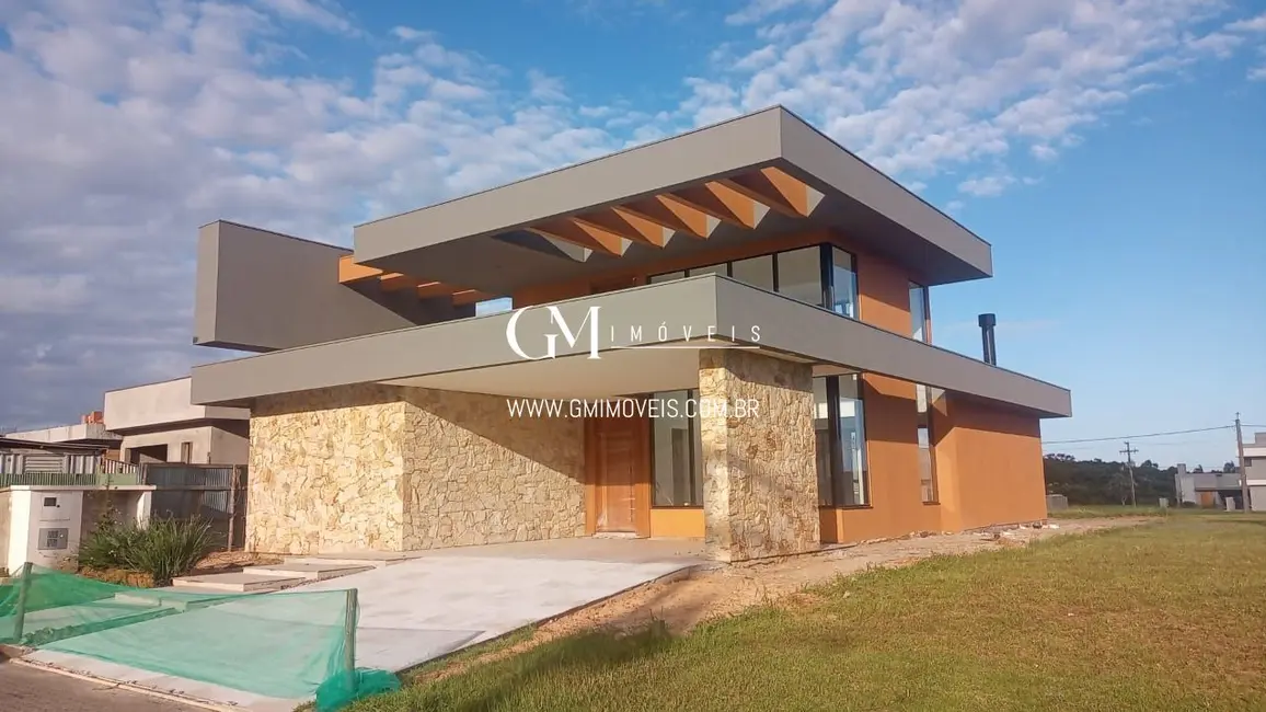 Foto 3 de Casa de Condomínio com 3 quartos à venda, 247m2 em Torres - RS