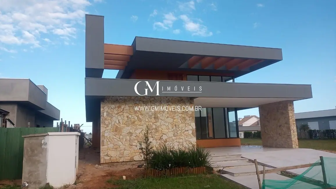 Foto 2 de Casa de Condomínio com 3 quartos à venda, 247m2 em Torres - RS