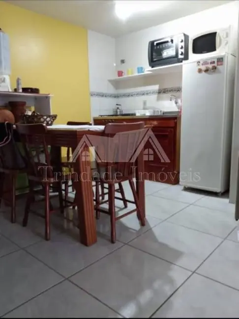Apartamento com 1 quarto à venda, 48m2 em Capao Da Canoa - RS - imagem 7 Foto 7 de Apartamento com 1 quarto à venda, 48m2 em Capao Da Canoa - RS