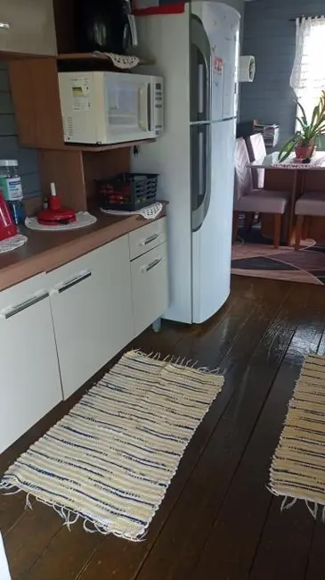 Casa com 2 quartos à venda, 100m2 em Capao Da Canoa - RS - imagem 9 Foto 9 de Casa com 2 quartos à venda, 100m2 em Capao Da Canoa - RS