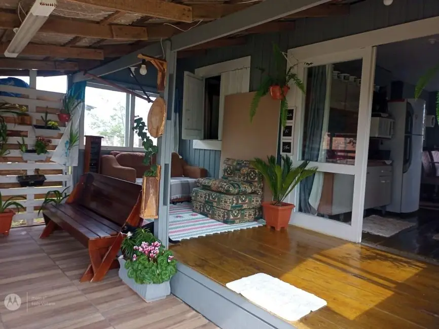 Casa com 2 quartos à venda, 100m2 em Capao Da Canoa - RS - imagem 8 Foto 8 de Casa com 2 quartos à venda, 100m2 em Capao Da Canoa - RS