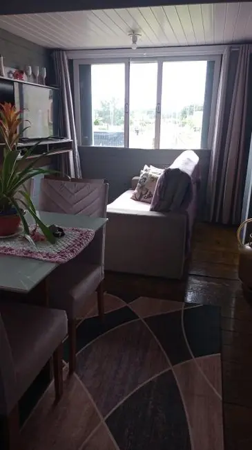 Casa com 2 quartos à venda, 100m2 em Capao Da Canoa - RS - imagem 6 Foto 6 de Casa com 2 quartos à venda, 100m2 em Capao Da Canoa - RS