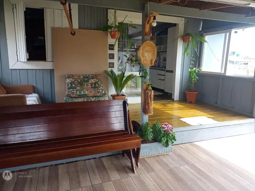 Casa com 2 quartos à venda, 100m2 em Capao Da Canoa - RS - imagem 5 Foto 5 de Casa com 2 quartos à venda, 100m2 em Capao Da Canoa - RS