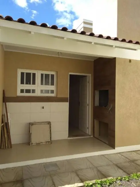 Casa com 2 quartos à venda, 83m2 em Capao Da Canoa - RS - imagem 1 Foto 1 de Casa com 2 quartos à venda, 83m2 em Capao Da Canoa - RS