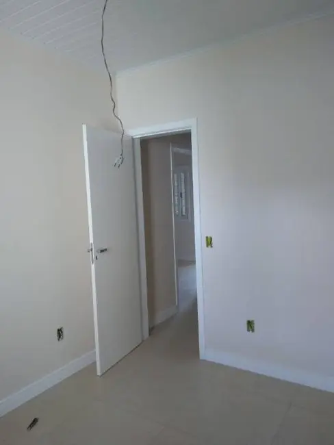 Casa com 2 quartos à venda, 83m2 em Capao Da Canoa - RS - imagem 2 Foto 2 de Casa com 2 quartos à venda, 83m2 em Capao Da Canoa - RS