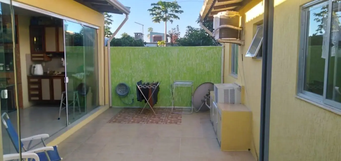 Casa com 2 quartos à venda, 120m2 em Capao Da Canoa - RS - imagem 1 Foto 1 de Casa com 2 quartos à venda, 120m2 em Capao Da Canoa - RS