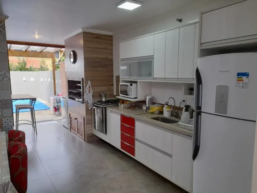 Sobrado com 2 quartos à venda, 150m2 em Capao Da Canoa - RS - imagem 8 Foto 8 de Sobrado com 2 quartos à venda, 150m2 em Capao Da Canoa - RS