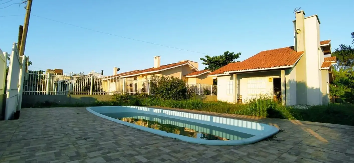 Casa com 3 quartos à venda, 120m2 em Capao Da Canoa - RS - imagem 1 Foto 1 de Casa com 3 quartos à venda, 120m2 em Capao Da Canoa - RS