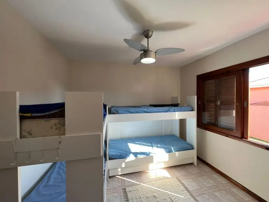 Foto 2 de Sobrado com 3 quartos à venda, 180m2 em Capao Da Canoa - RS