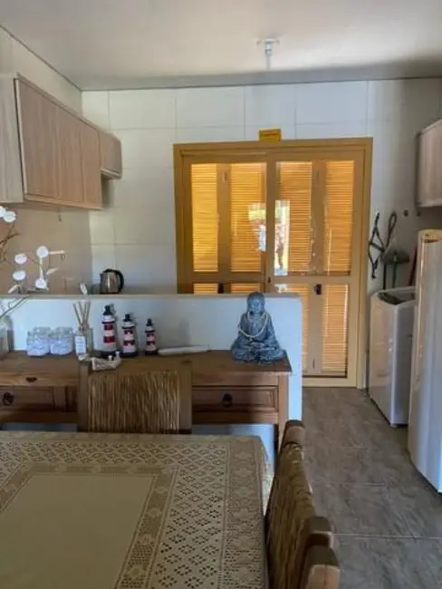 Casa de Condomínio com 2 quartos à venda, 85m2 em Capao Da Canoa - RS - imagem 4 Foto 4 de Casa de Condomínio com 2 quartos à venda, 85m2 em Capao Da Canoa - RS
