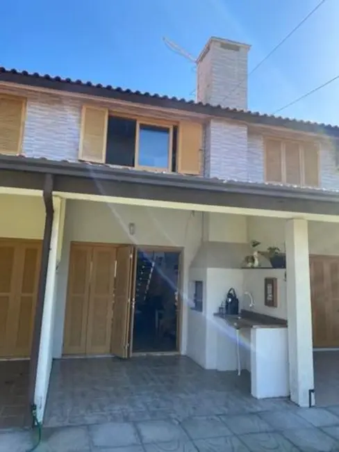 Casa de Condomínio com 2 quartos à venda, 85m2 em Capao Da Canoa - RS - imagem 1 Foto 1 de Casa de Condomínio com 2 quartos à venda, 85m2 em Capao Da Canoa - RS