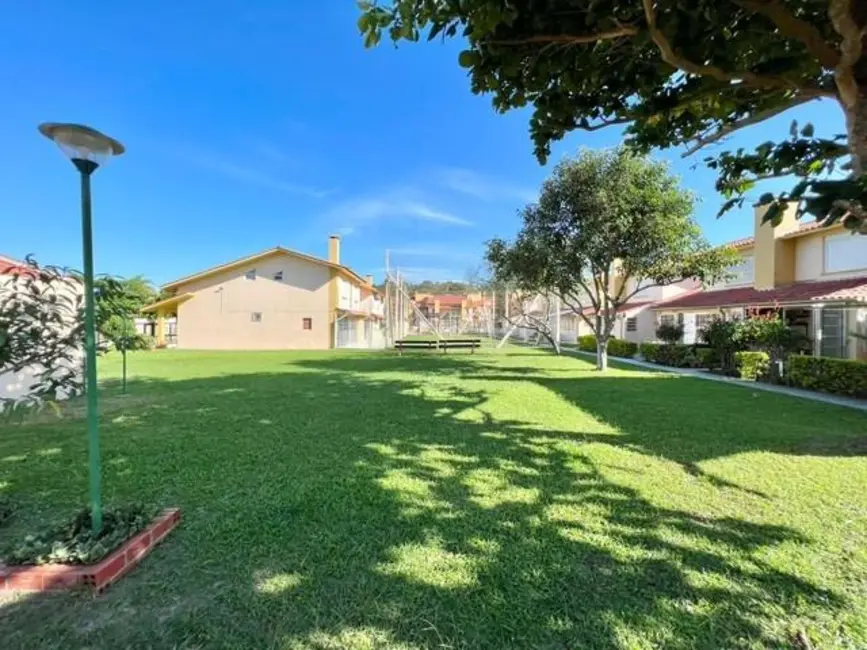 Casa de Condomínio com 2 quartos à venda, 75m2 em Capao Da Canoa - RS - imagem 2 Foto 2 de Casa de Condomínio com 2 quartos à venda, 75m2 em Capao Da Canoa - RS