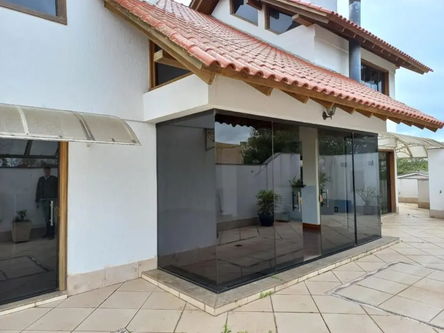 Foto 1 de Casa com 7 quartos à venda, 657m2 em Anchieta, Porto Alegre - RS