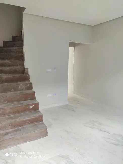 Foto 2 de Casa de Condomínio com 2 quartos à venda, 59m2 em Aviação, Praia Grande - SP