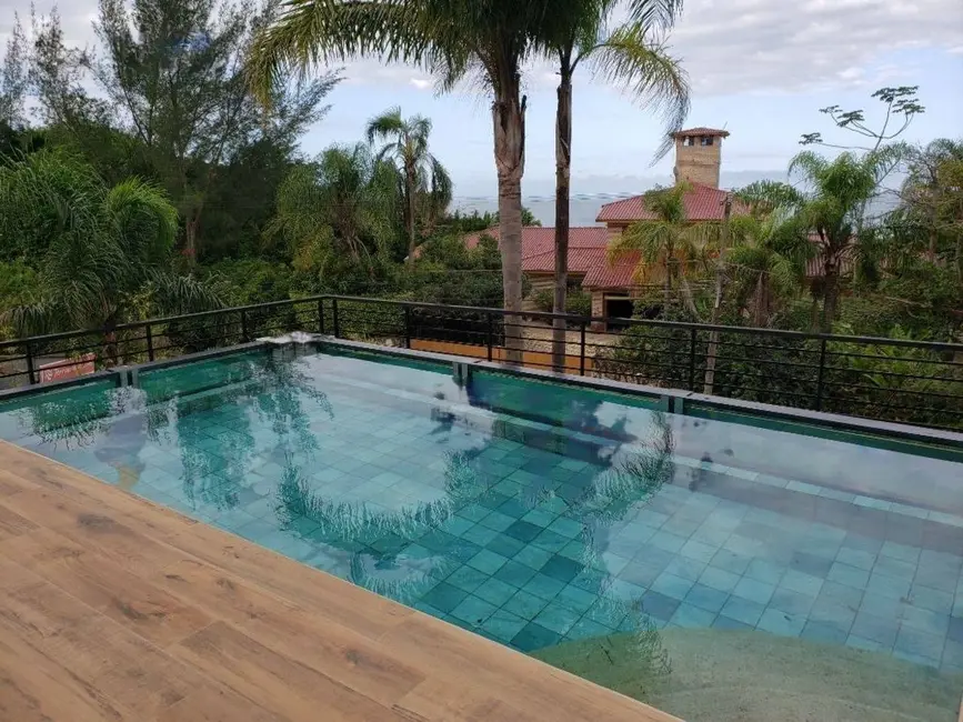 Foto 1 de Casa com 4 quartos à venda, 322m2 em Garopaba - SC