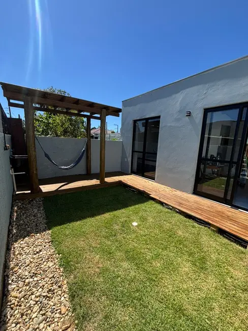 Foto 1 de Casa com 3 quartos à venda, 110m2 em Garopaba - SC