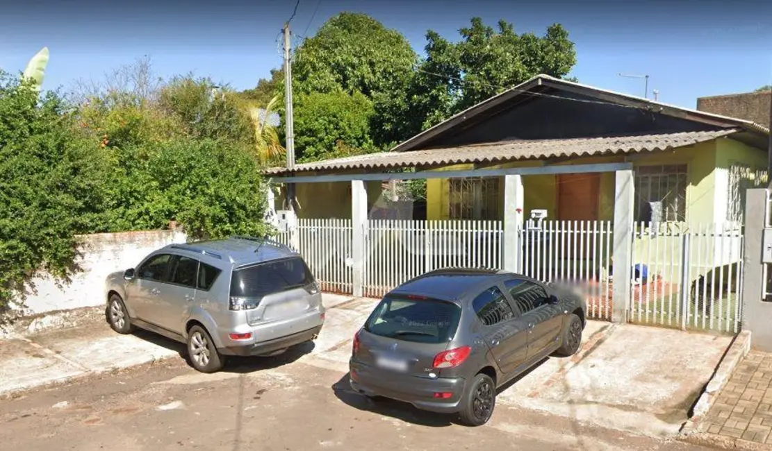 Casa com 3 quartos à venda, 128m2 em Centro, Toledo - PR - imagem 1 Foto 1 de Casa com 3 quartos à venda, 128m2 em Centro, Toledo - PR
