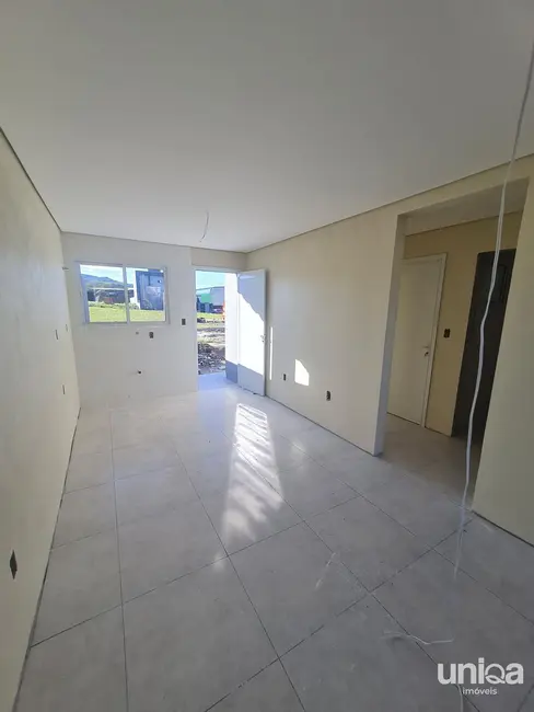 Foto 2 de Casa com 2 quartos à venda, 50m2 em Tomazetti, Santa Maria - RS