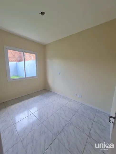 Casa com 2 quartos à venda, 61m2 em Diácono João Luiz Pozzobon, Santa Maria - RS - imagem 6 Foto 6 de Casa com 2 quartos à venda, 61m2 em Diácono João Luiz Pozzobon, Santa Maria - RS