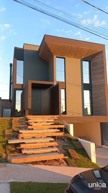 Foto 1 de Casa de Condomínio com 3 quartos à venda, 289m2 em Tomazetti, Santa Maria - RS