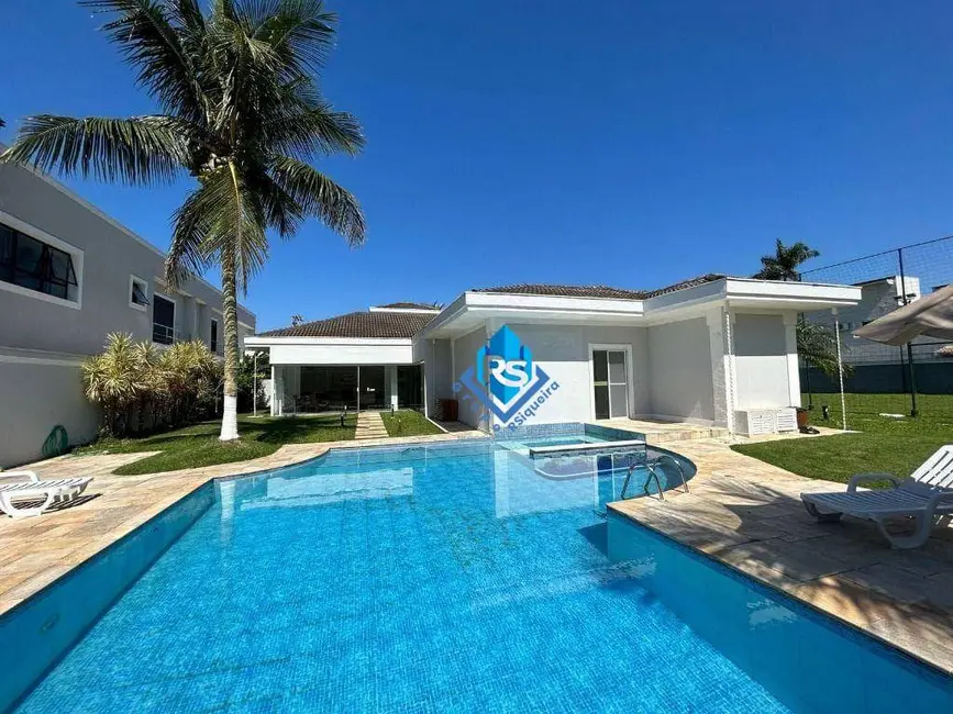 Foto 1 de Casa de Condomínio com 7 quartos à venda e para alugar, 2000m2 em Jardim Acapulco, Guaruja - SP