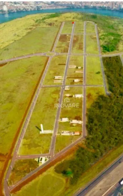 Foto 1 de Terreno / Lote à venda, 252m2 em Arapora - MG