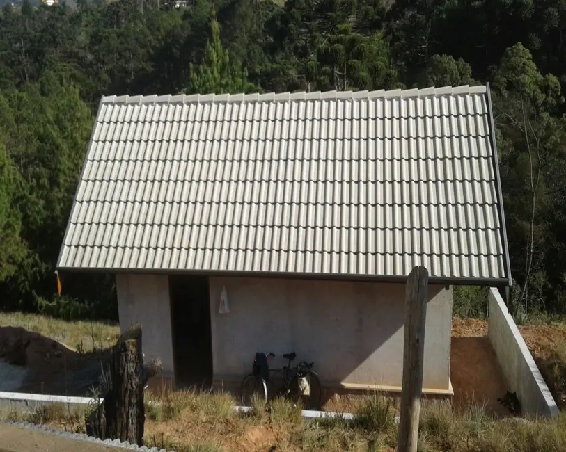Foto 3 de Sobrado com 4 quartos à venda em Campos Do Jordao - SP