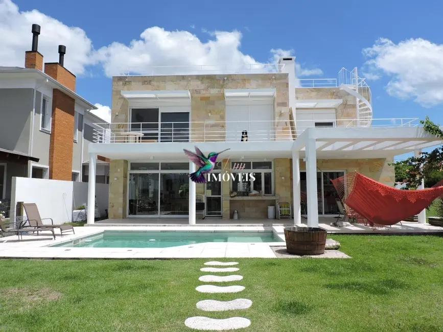Foto 1 de Casa com 4 quartos à venda, 330m2 em Eldorado Do Sul - RS
