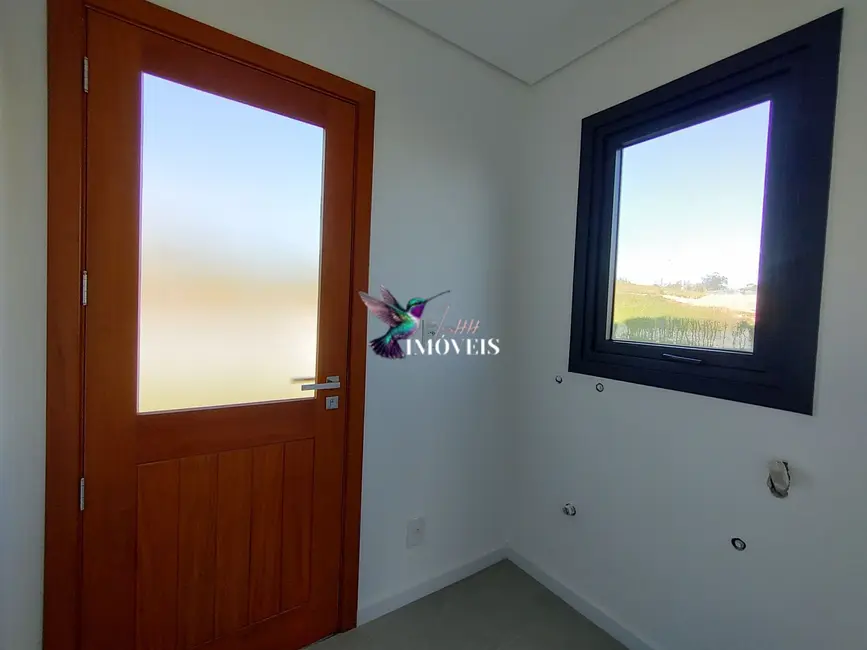 Foto 9 de Casa de Condomínio com 3 quartos à venda, 233m2 em Guaiba - RS