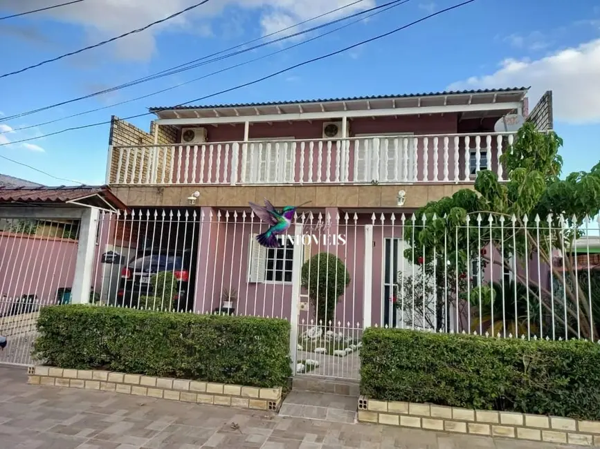Foto 1 de Casa com 4 quartos à venda, 300m2 em Guaiba - RS