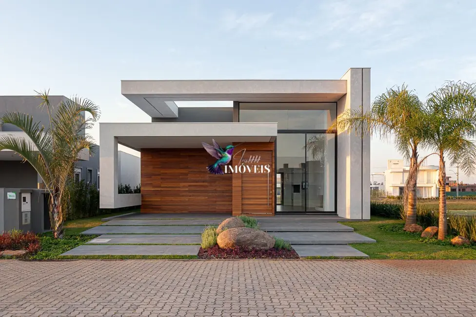 Casa com 3 quartos à venda, 205m2 em Torres - RS - imagem 1 Foto 1 de Casa com 3 quartos à venda, 205m2 em Torres - RS