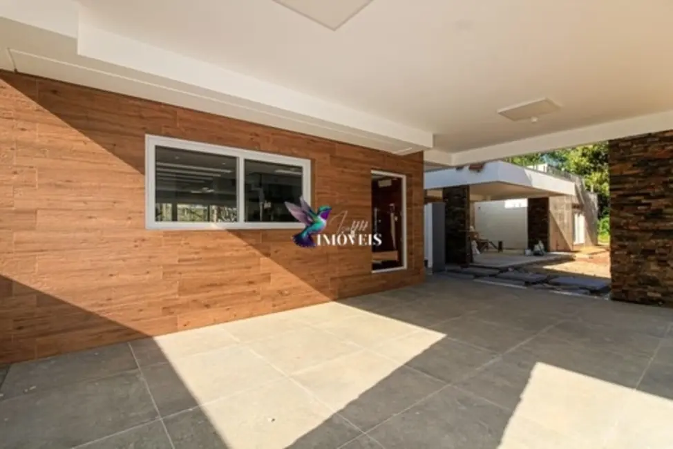 Foto 2 de Casa de Condomínio com 3 quartos à venda, 300m2 em Pedra Redonda, Porto Alegre - RS