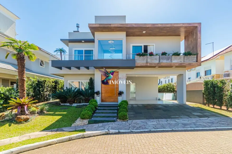 Casa de Condomínio com 3 quartos à venda, 286m2 em Marechal Rondon, Canoas - RS - imagem 2 Foto 2 de Casa de Condomínio com 3 quartos à venda, 286m2 em Marechal Rondon, Canoas - RS