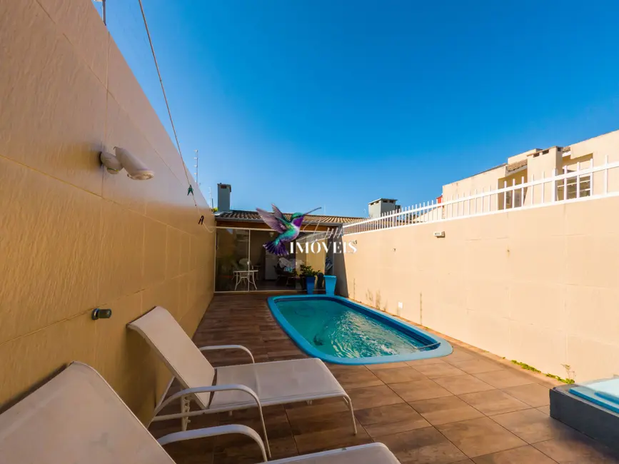 Foto 42 de Casa com 2 quartos à venda, 165m2 em Centro, Tramandai - RS