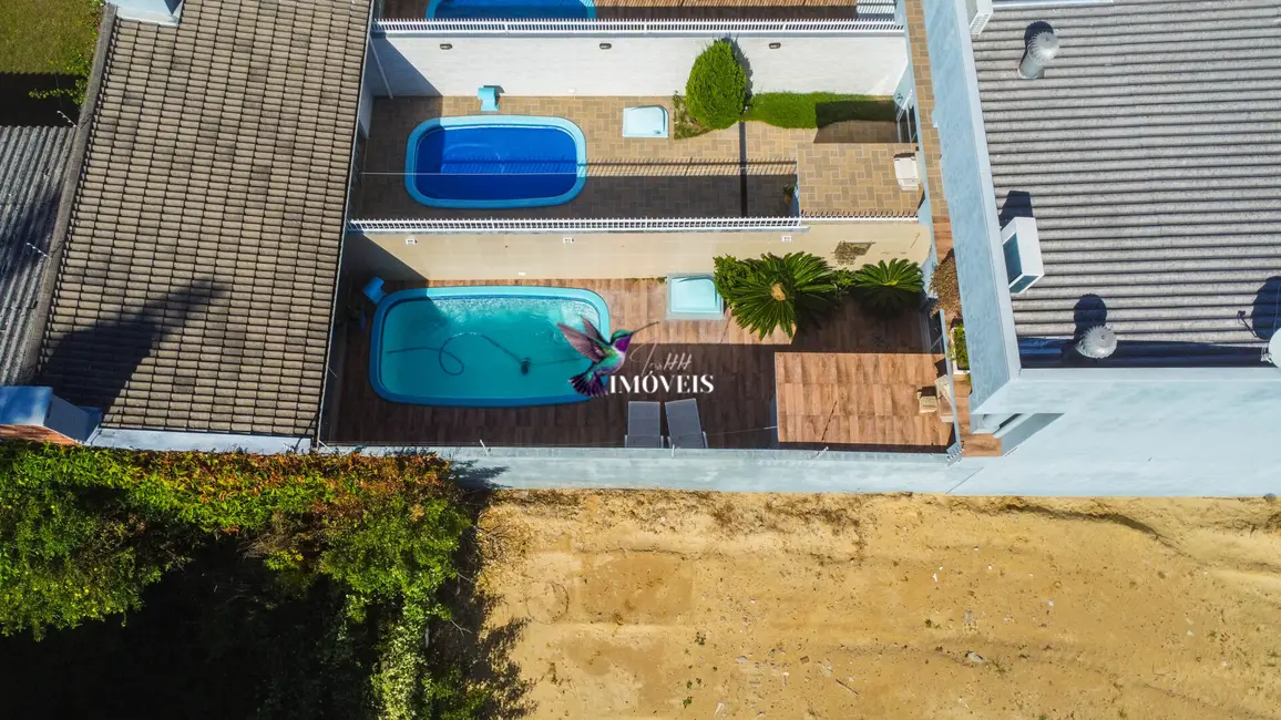 Foto 11 de Casa com 2 quartos à venda, 165m2 em Centro, Tramandai - RS