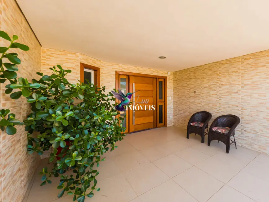 Foto 14 de Casa com 2 quartos à venda, 165m2 em Centro, Tramandai - RS