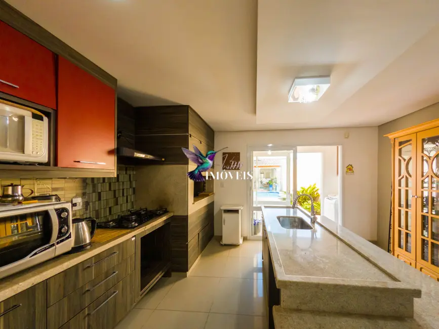 Foto 36 de Casa com 2 quartos à venda, 165m2 em Centro, Tramandai - RS