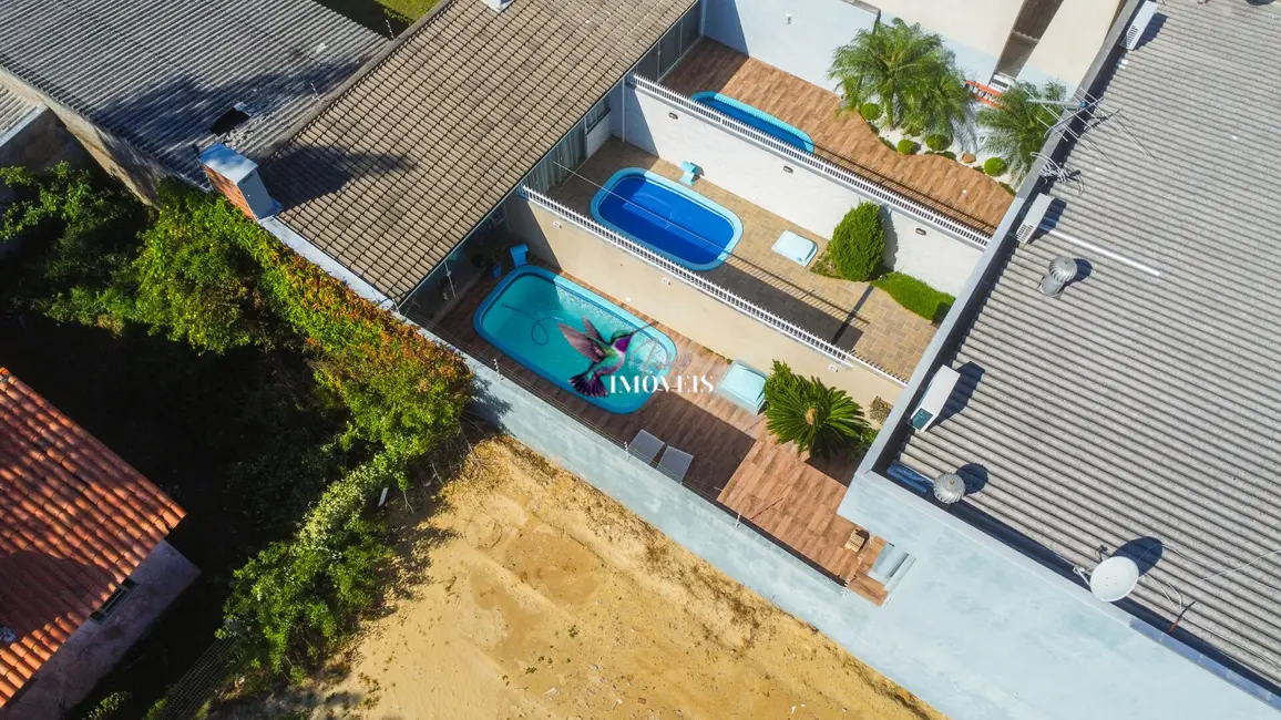 Foto 10 de Casa com 2 quartos à venda, 165m2 em Centro, Tramandai - RS