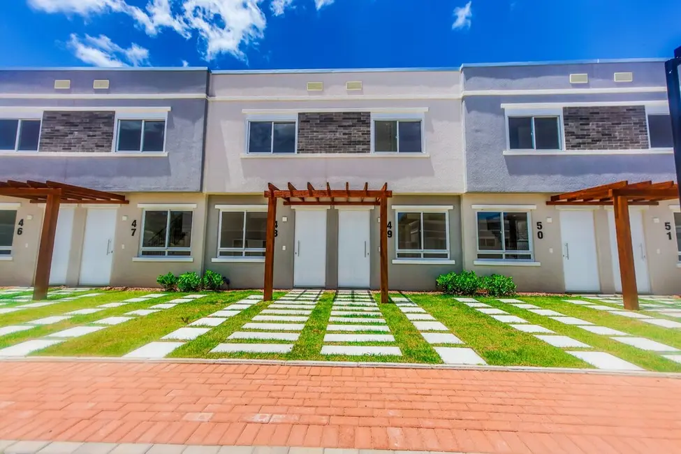 Casa de Condomínio com 2 quartos à venda, 87m2 em Vila Nova, Porto Alegre - RS - imagem 3 Foto 3 de Casa de Condomínio com 2 quartos à venda, 87m2 em Vila Nova, Porto Alegre - RS