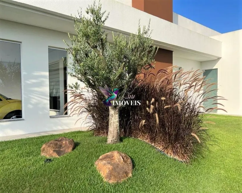 Foto 3 de Casa com 3 quartos à venda, 196m2 em Torres - RS