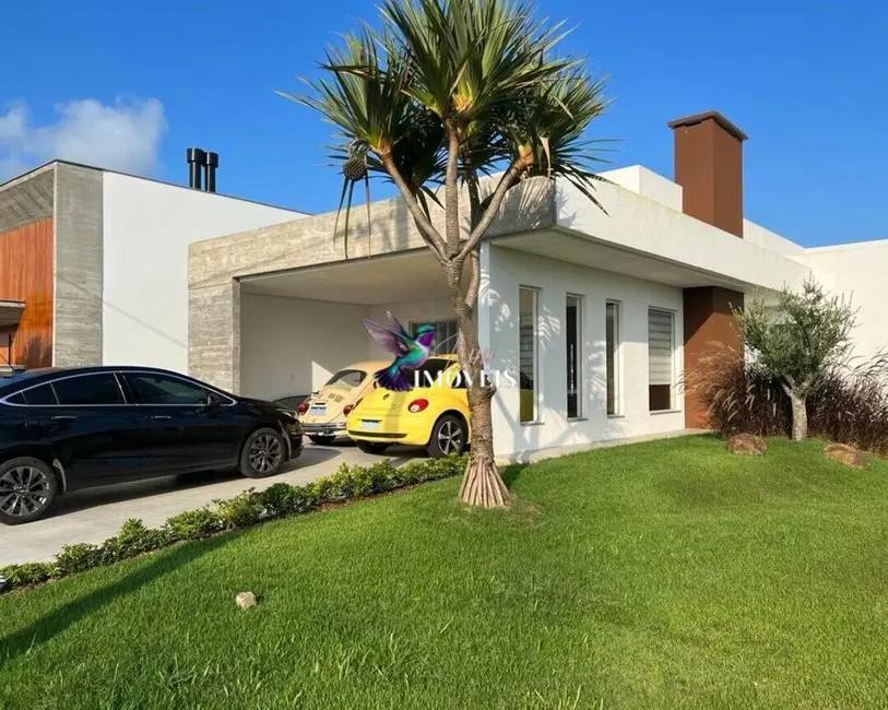 Foto 2 de Casa com 3 quartos à venda, 196m2 em Torres - RS