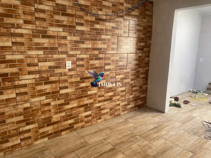 Foto 2 de Apartamento com 2 quartos à venda, 46m2 em Guaiba - RS