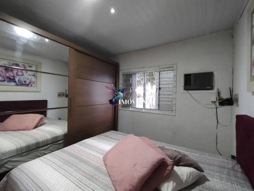 Foto 6 de Casa com 2 quartos à venda, 133m2 em Guaiba - RS